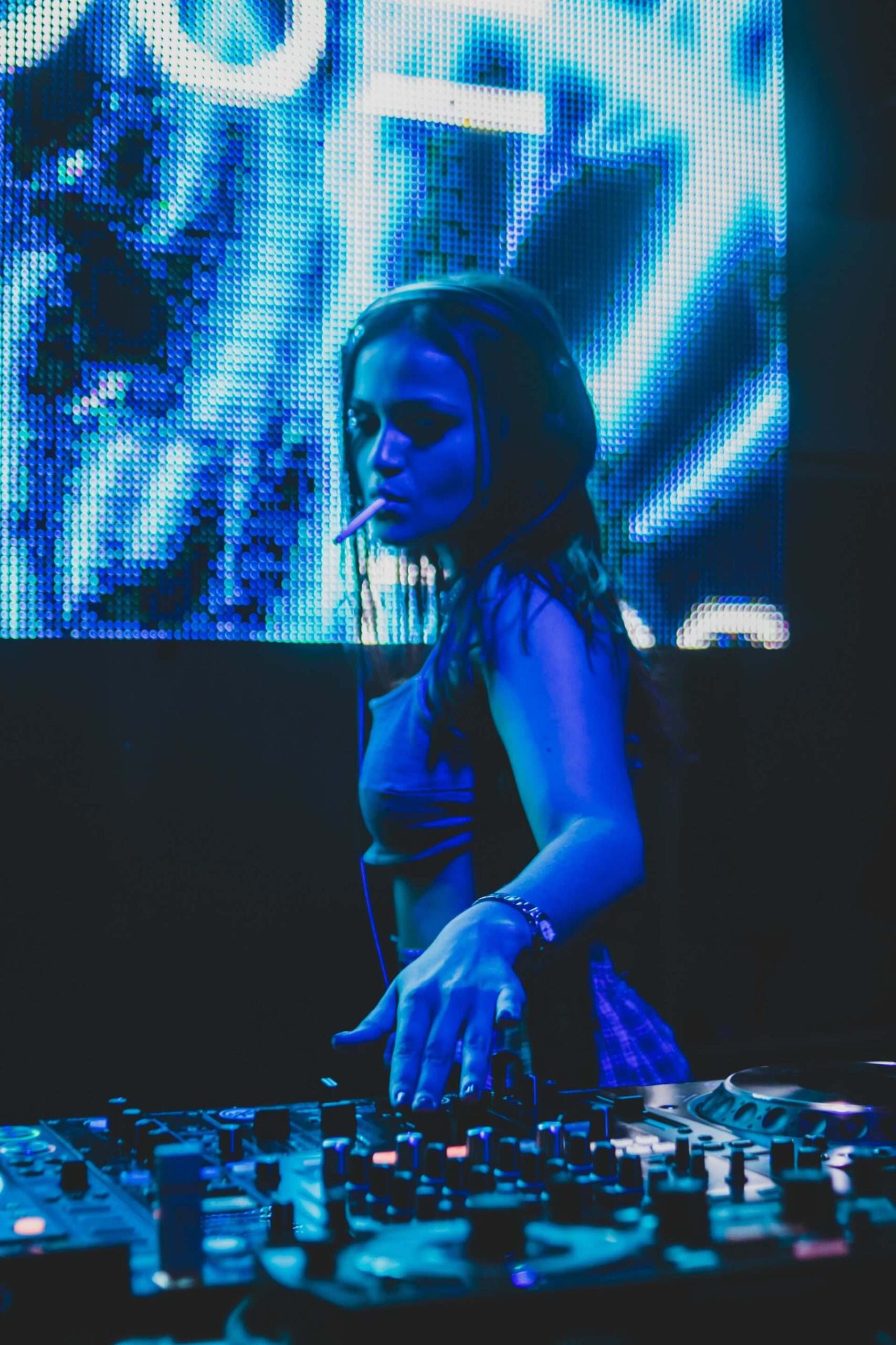 girl DJ playing music